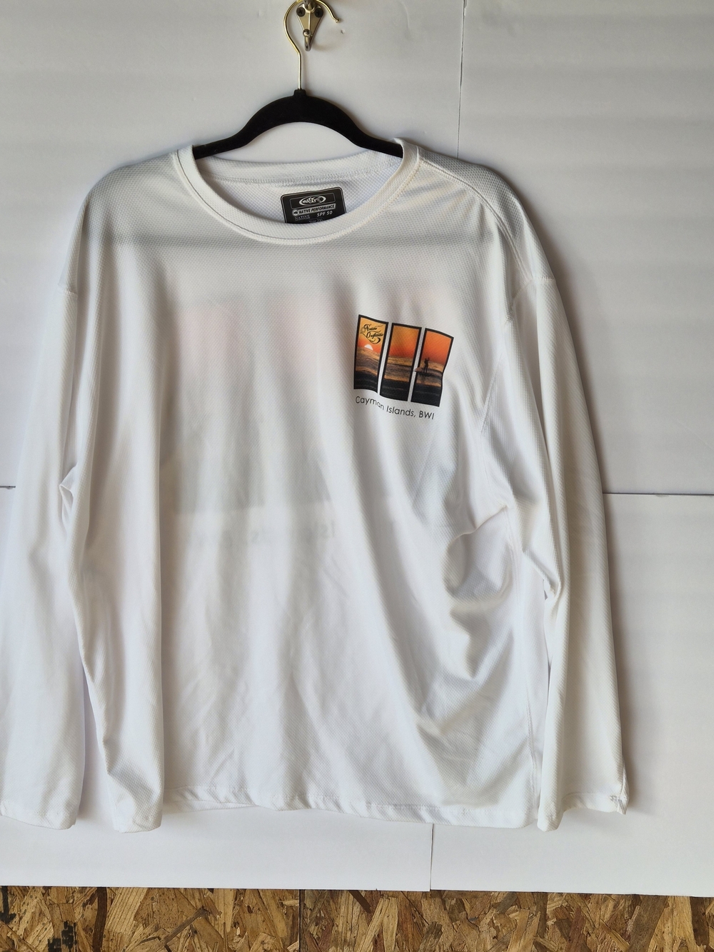 Reel Legends White Long Sleeve Performance Tee with Orange Sunset Chest Graphic
